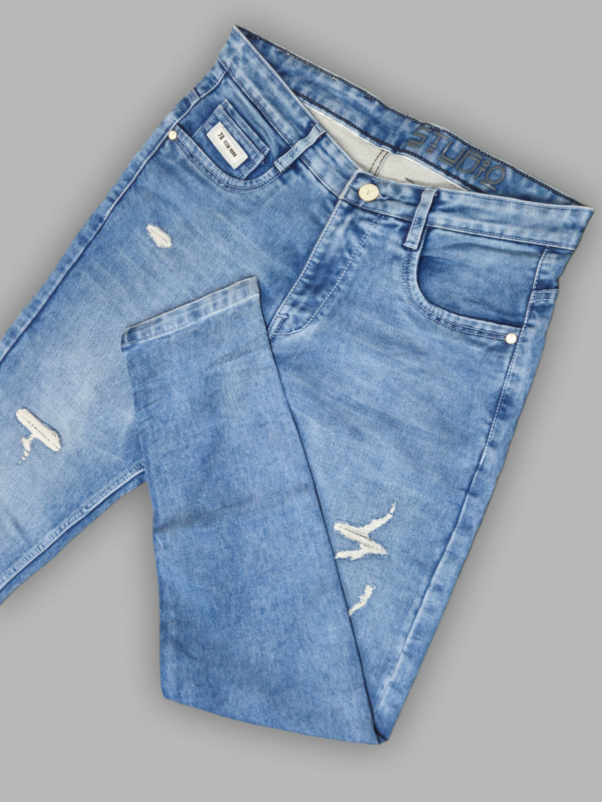 Light Blue with Light Fade Distressed Mid-Rise Relaxed Fit Jeans