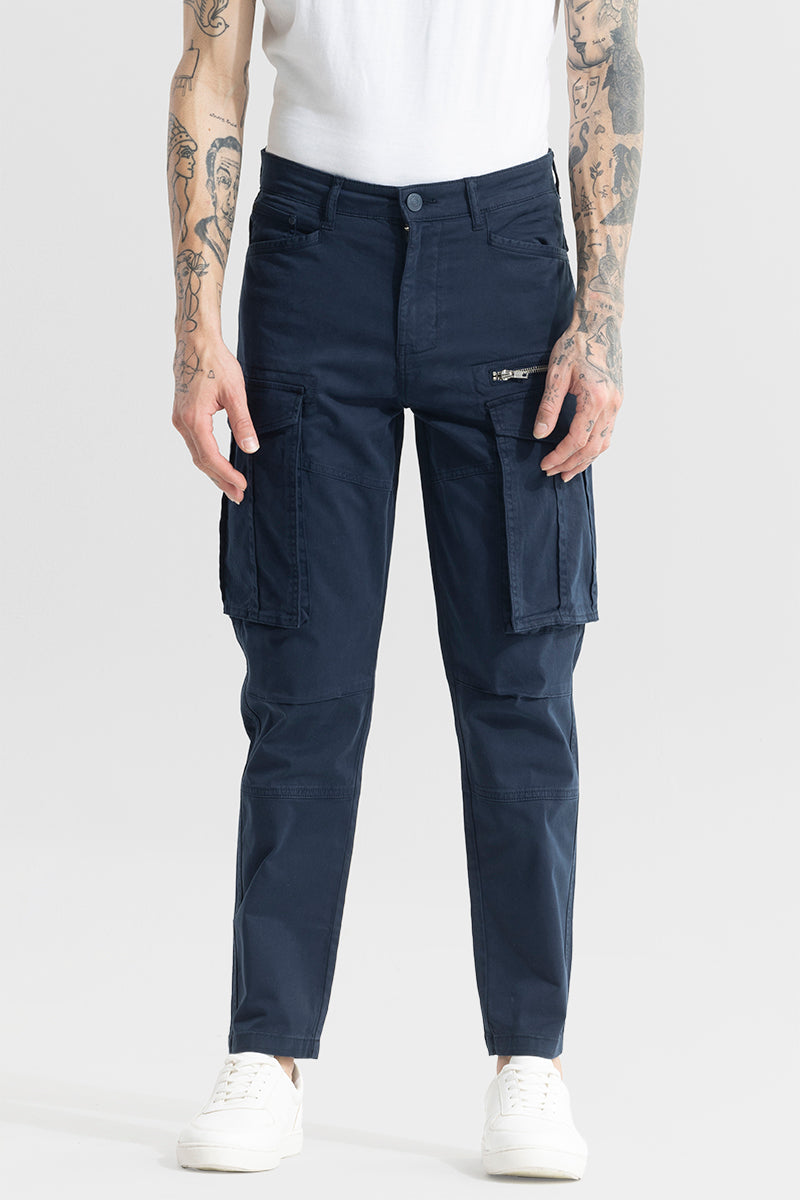 Men wearing men's navy cargo pants by trekyoo with multiple pockets and white sneakers