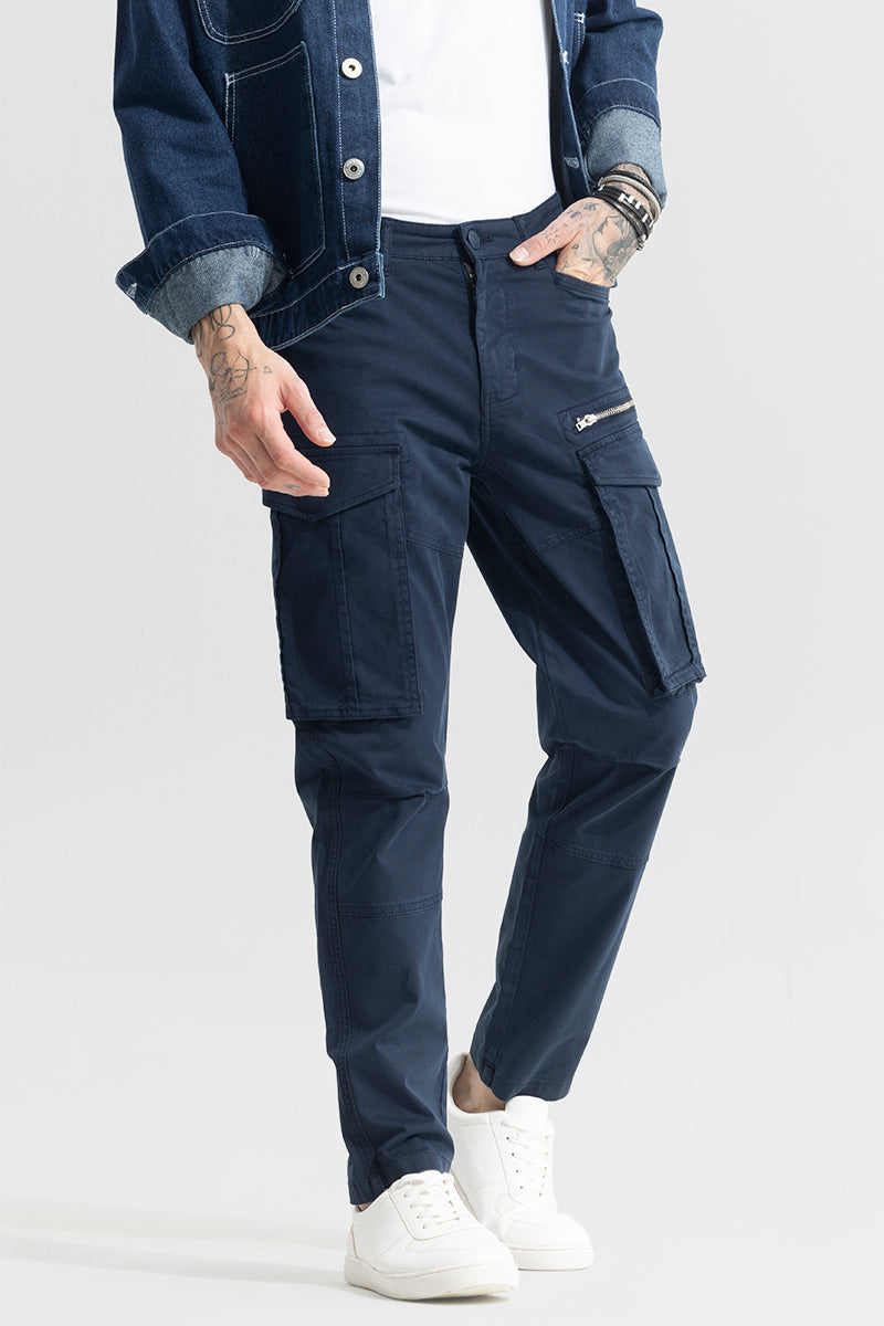 Men wearing men's navy cargo pants by Trekyoo with multiple pockets and white sneakers