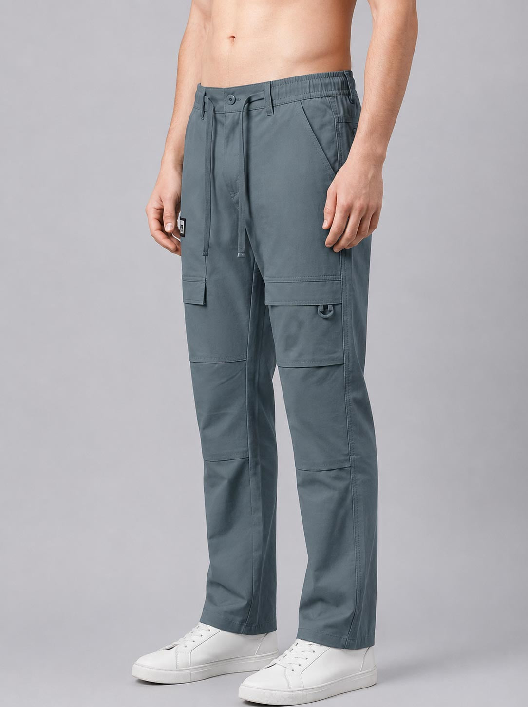 Men’s baggy fit sage green cargo jogger pants side view